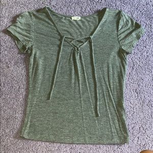 Gray tee with cross ties in the front